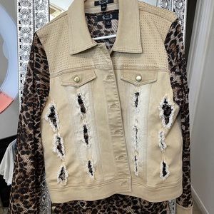 Animal print long sleeve cold shoulder top with matching distressed jacket. Set